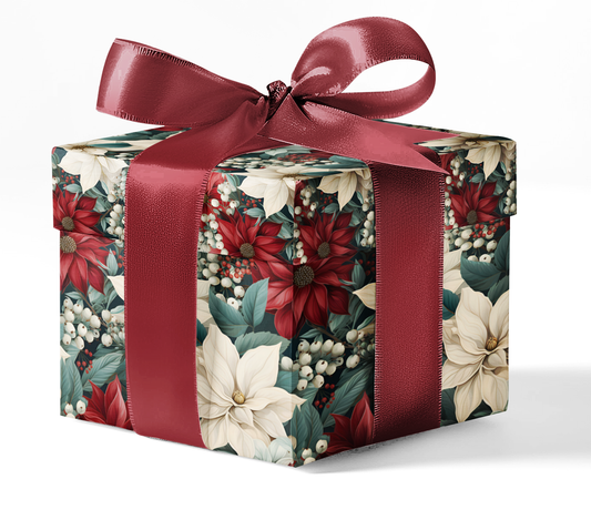 A gift box wrapped in custom wrapping paper with a floral pattern, tied with a red ribbon.