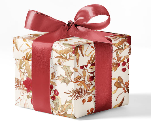 A gift box wrapped in custom wrapping paper with a floral pattern and a red ribbon.