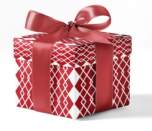 A gift box wrapped in red and white patterned wrapping paper with a red ribbon.