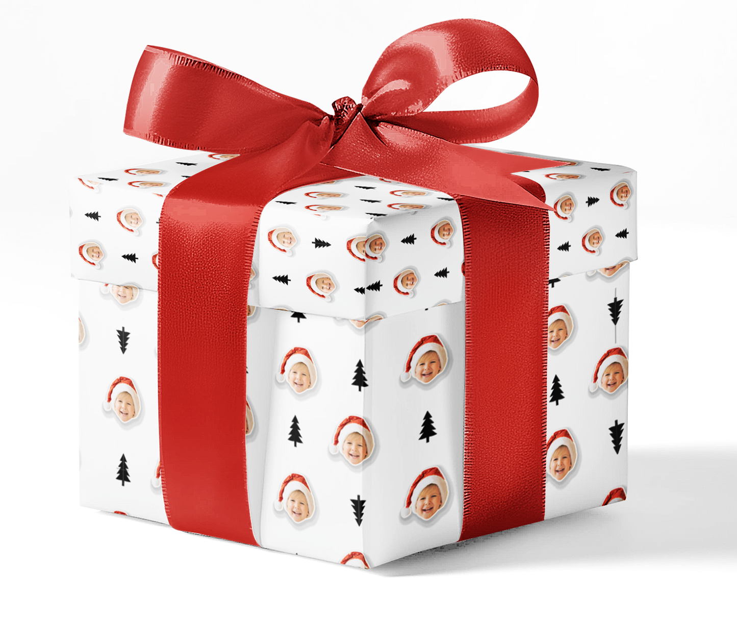 A gift box wrapped in black and white pine patterned wrapping paper with a red ribbon.