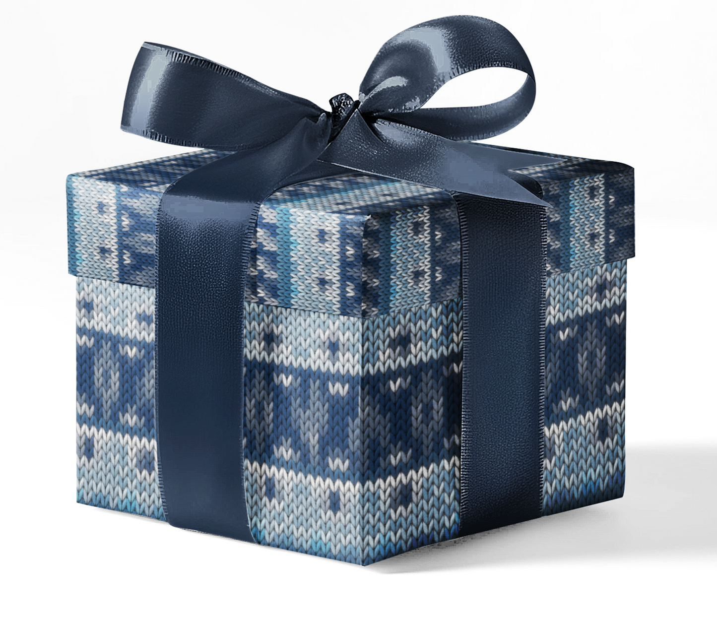 A gift box wrapped in blue wrapping paper with a geometric pattern and a dark blue ribbon.