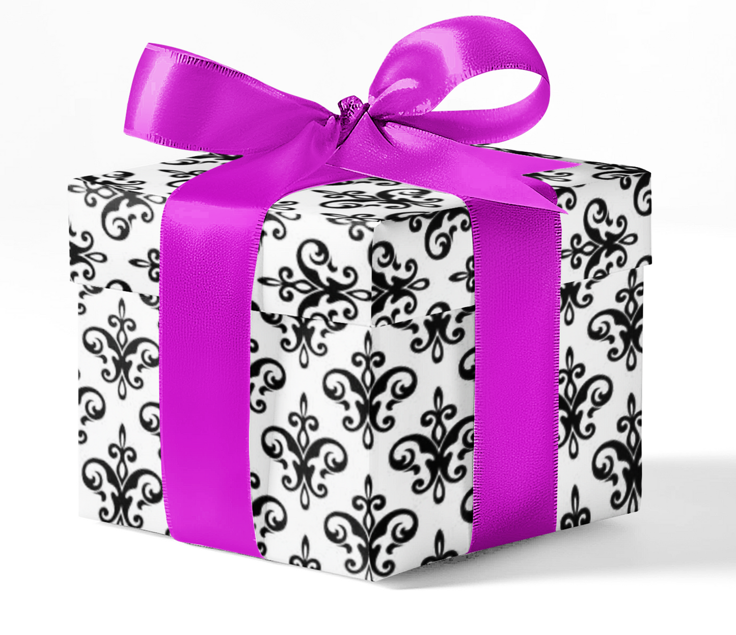 Elegant gift box wrapped in black and white damask custom wrapping paper, tied with a vibrant purple satin ribbon