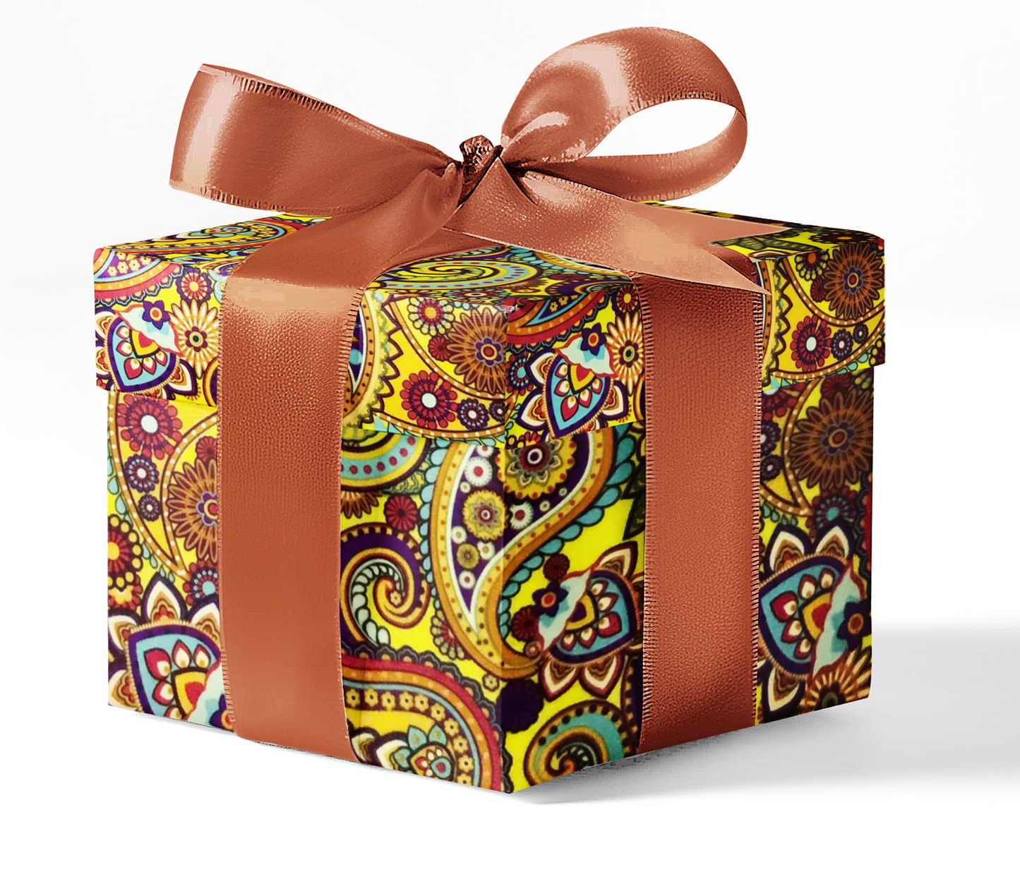 A gift box wrapped in custom BoHo print wrapping paper with a brown ribbon.