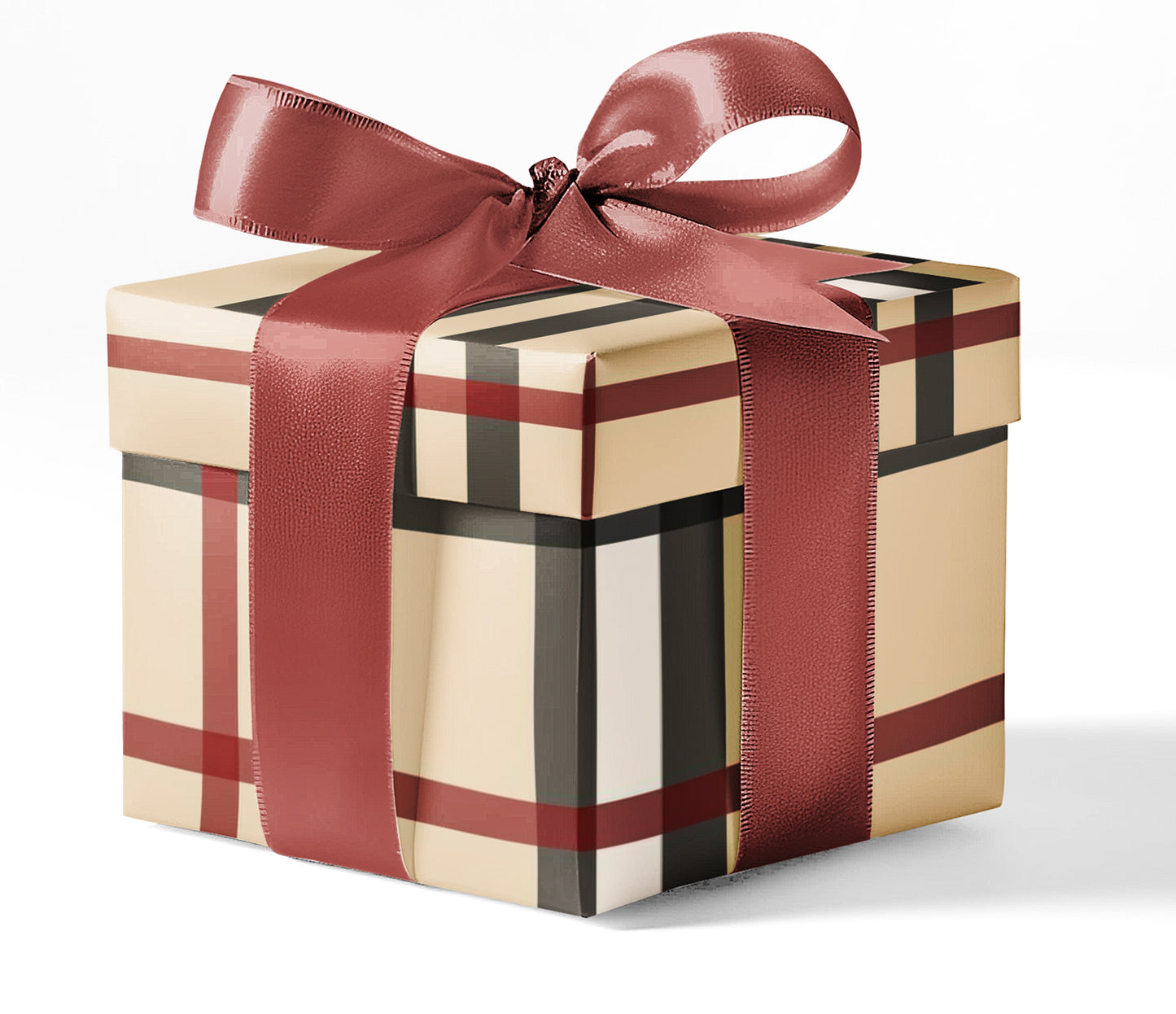 A gift box wrapped in Burberry check patterned wrapping paper with a red ribbon.