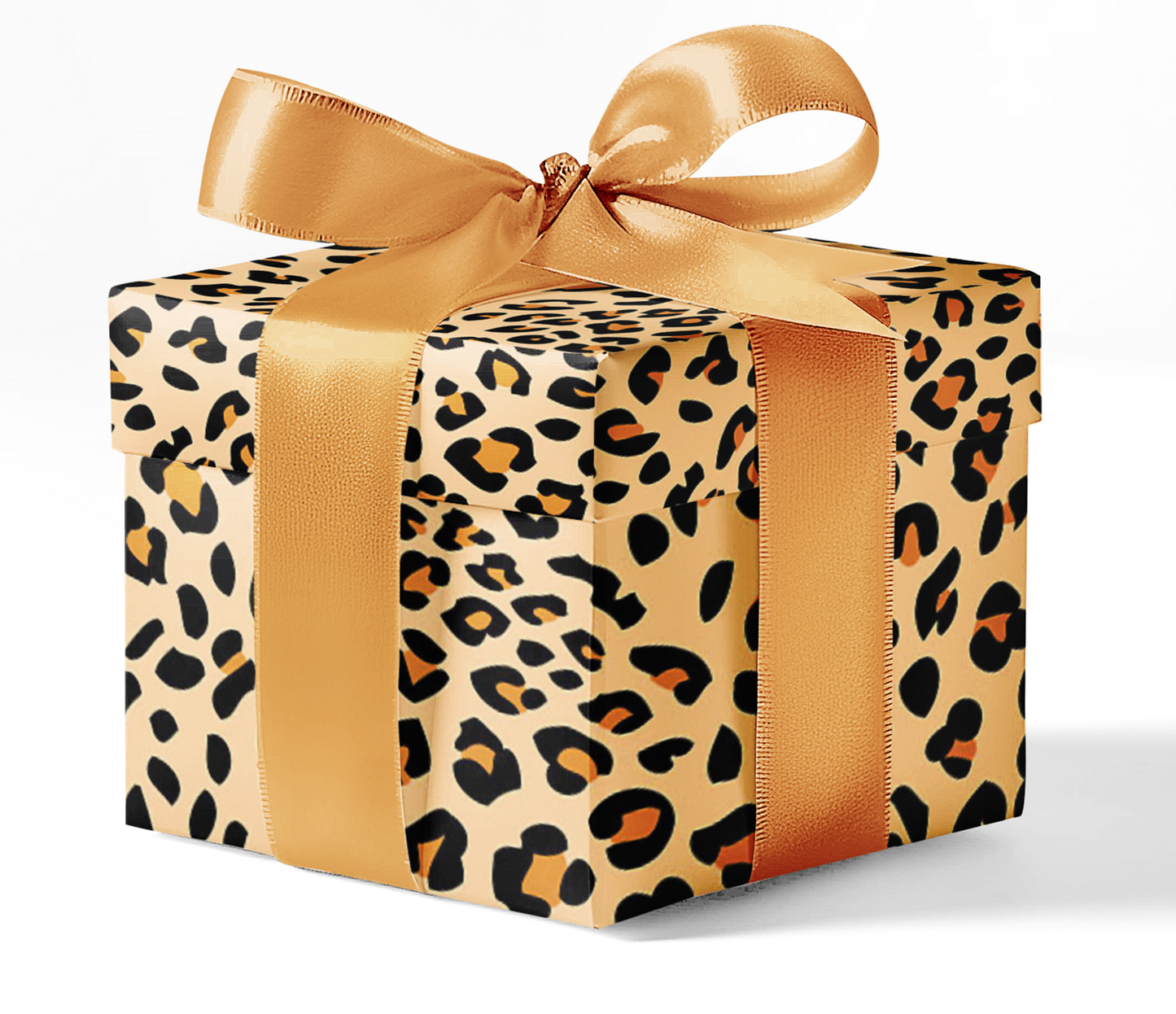 A gift box wrapped in custom cheetah patterned wrapping paper with a satin ribbon bow.