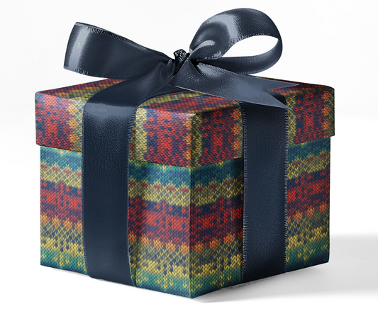 A gift box wrapped in custom wrapping paper with a geometric pattern, tied with a blue ribbon.