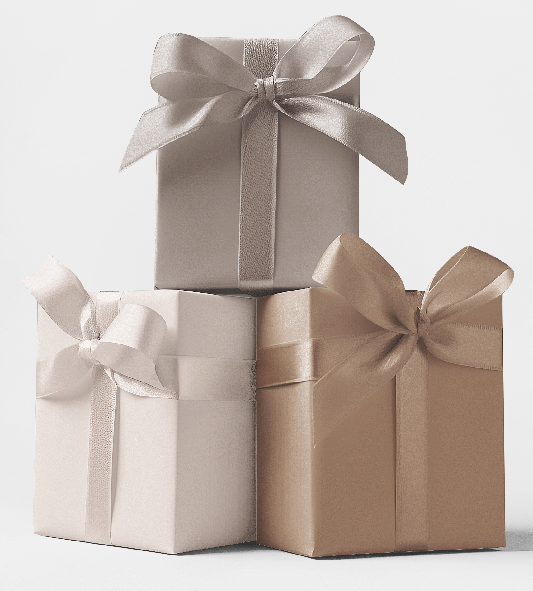 Three gift boxes wrapped in different shades of wrapping paper. The first box is silver with a satin finish, the second is beige with a matte finish, and the third is a combination of beige and brown with a matte finish.