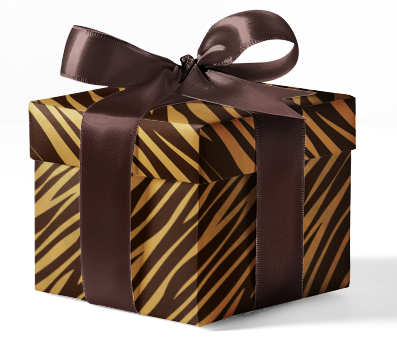 A gift box wrapped in animal print customizable wrapping paper with a brown ribbon.