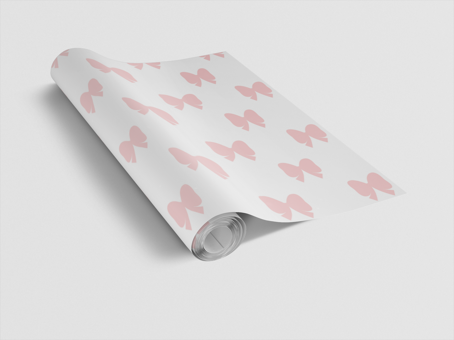 Roll of white paper with pink butterfly pattern on a light gray background