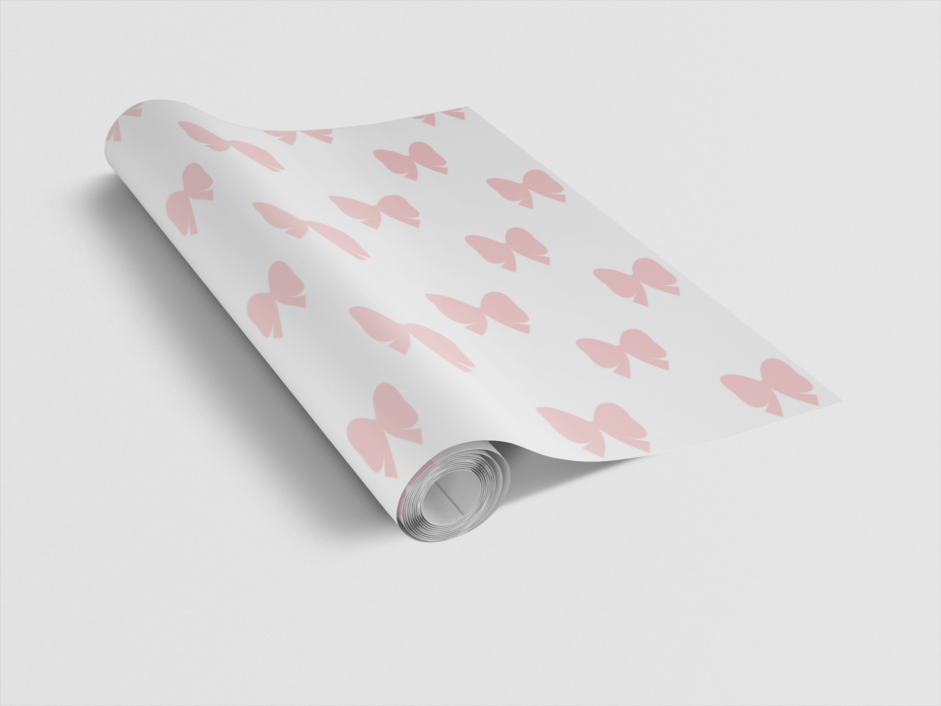 Roll of white paper with pink butterfly pattern on a light gray background