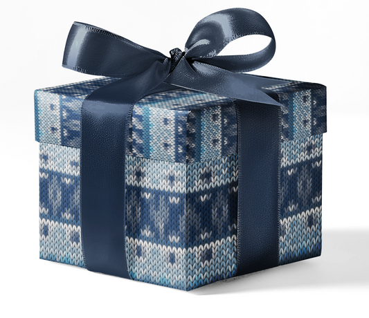 A gift box wrapped in blue wrapping paper with a geometric pattern and a dark blue ribbon.