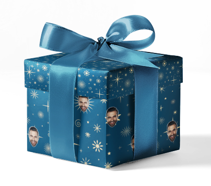 A custom wrapping paper with geometric patterns and personalized images, such as faces, in blue tones. Gift wrapped with a blue ribbon.