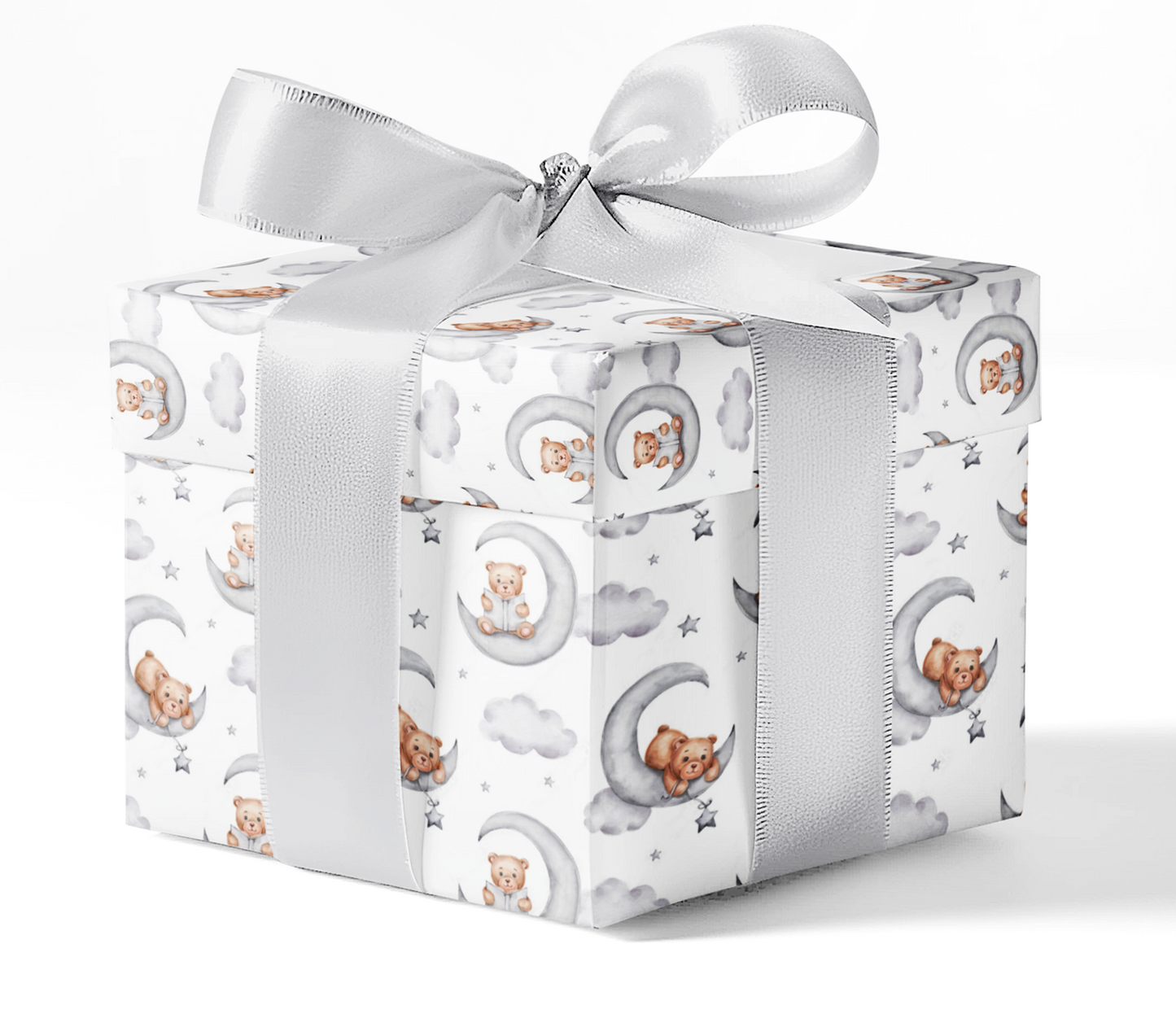 A gift wrapped in custom wrapping paper with a pattern of teddy bears and stars, presented with a white ribbon bow.