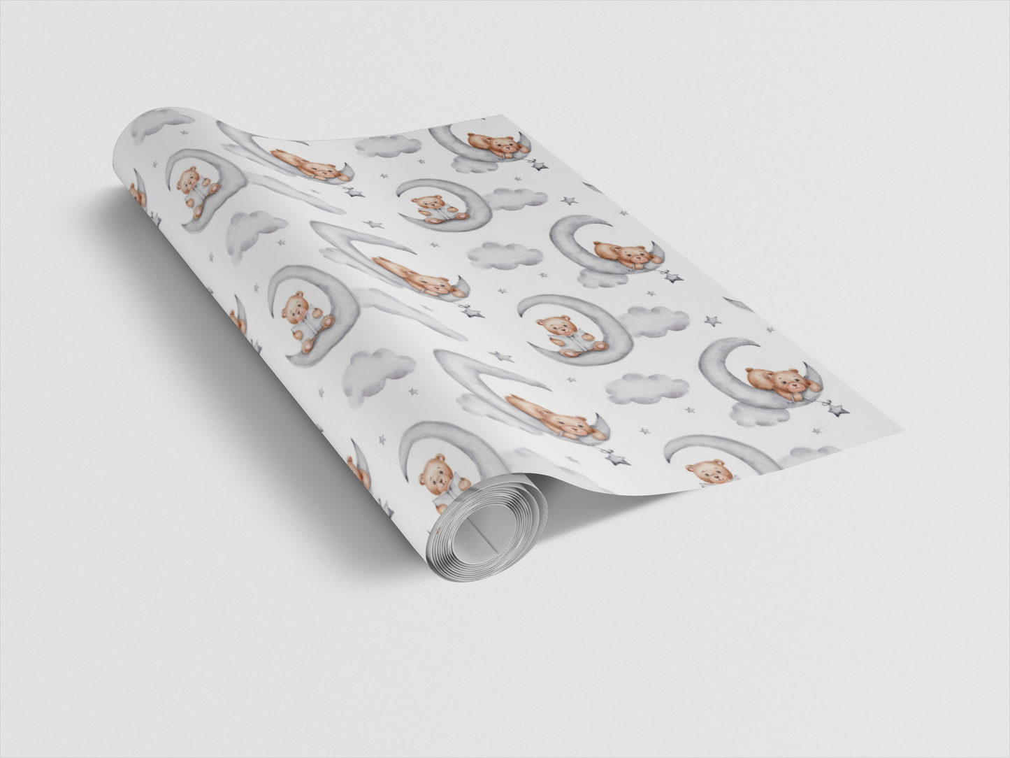 Roll of wrapping paper with teddy bear design on a light gray background