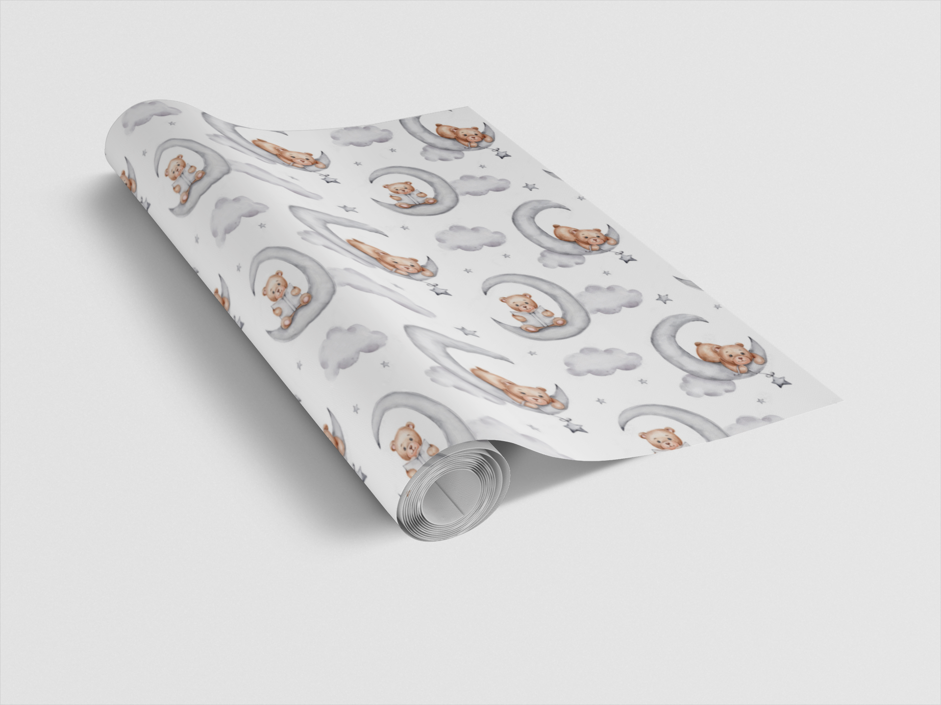 Roll of wrapping paper with teddy bear design on a light gray background