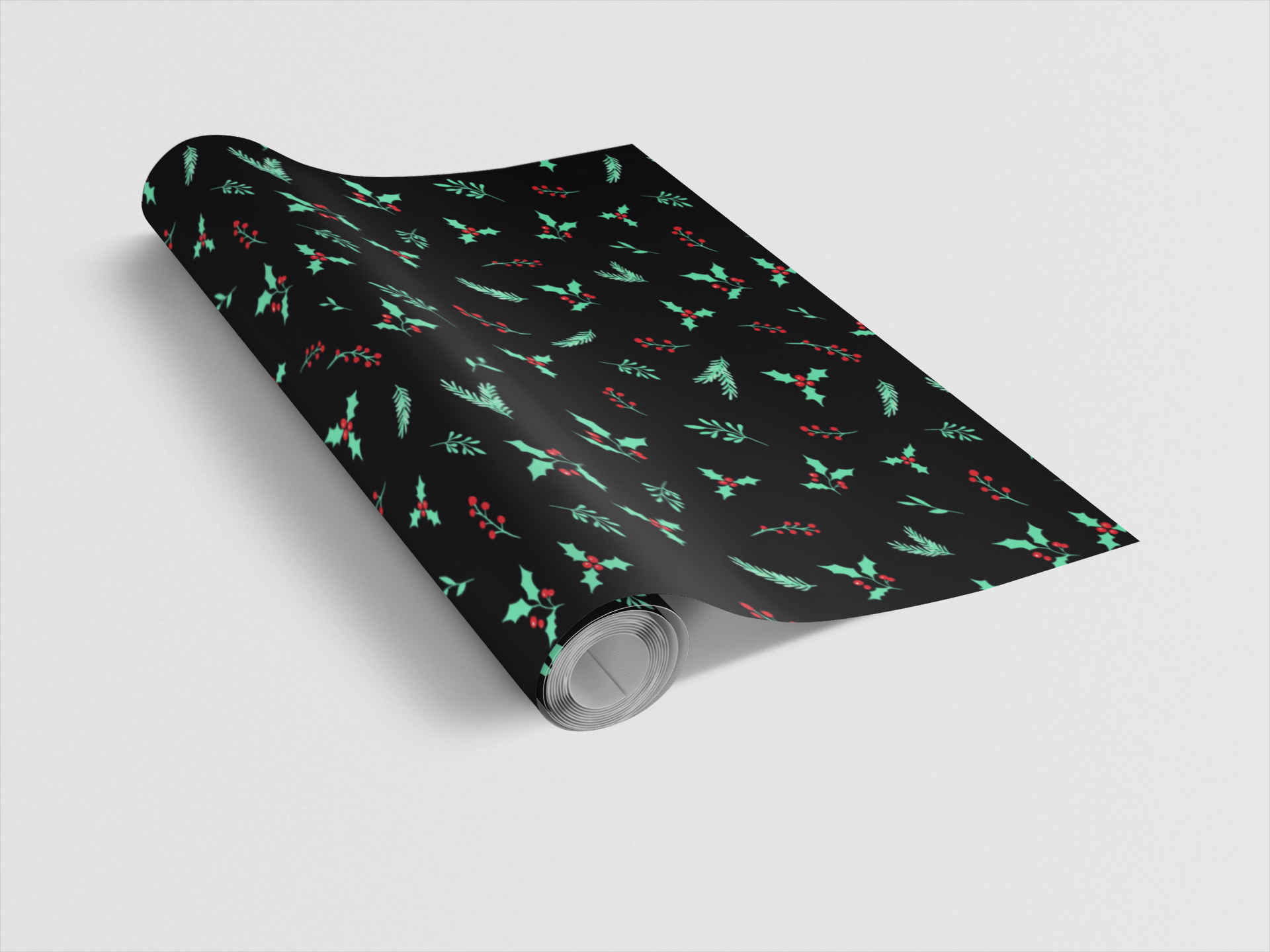 Roll of wrapping paper with Christmas-themed design on a white background