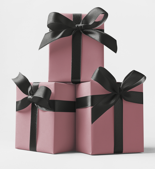 Three rectangular gift boxes in mauve color with black bows on top, stacked in a pyramid shape. custom wrapping paper available at CustomMyPrints.com.