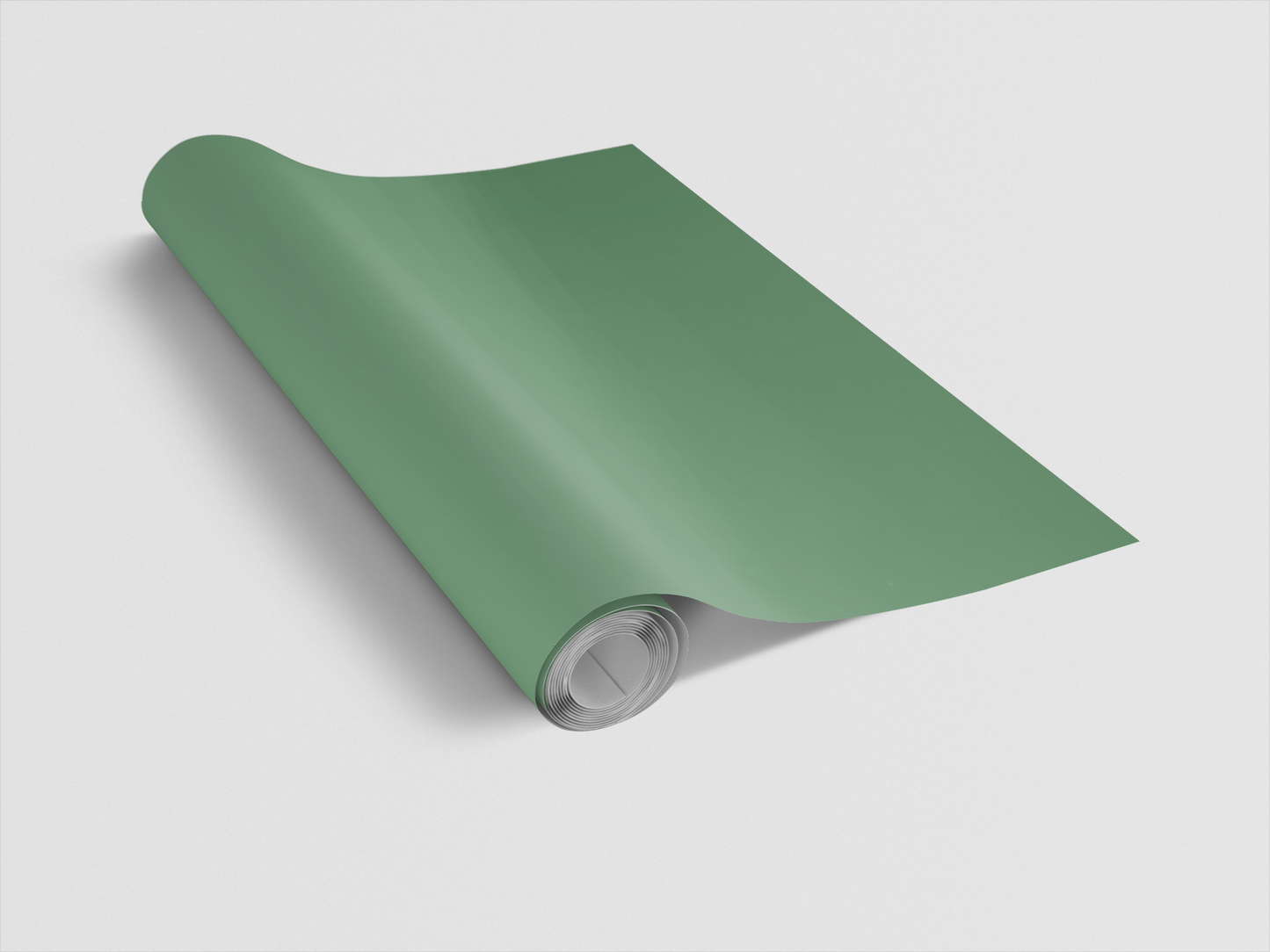Rolled-up green mat on a light gray background