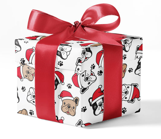 A gift box wrapped in custom wrapping paper with a doggie print and a red ribbon.