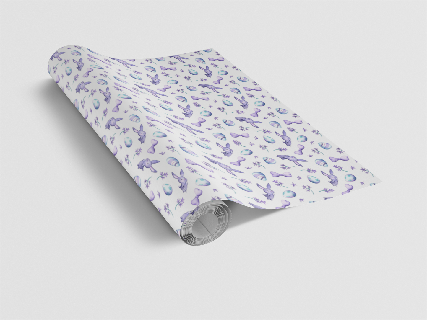 Roll of paper with a floral pattern on a light gray background