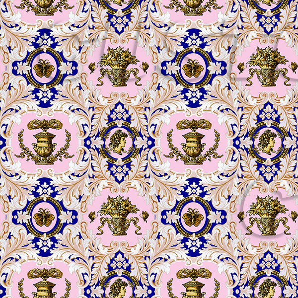 Decorative fabric pattern with gold and blue designs on a pink background