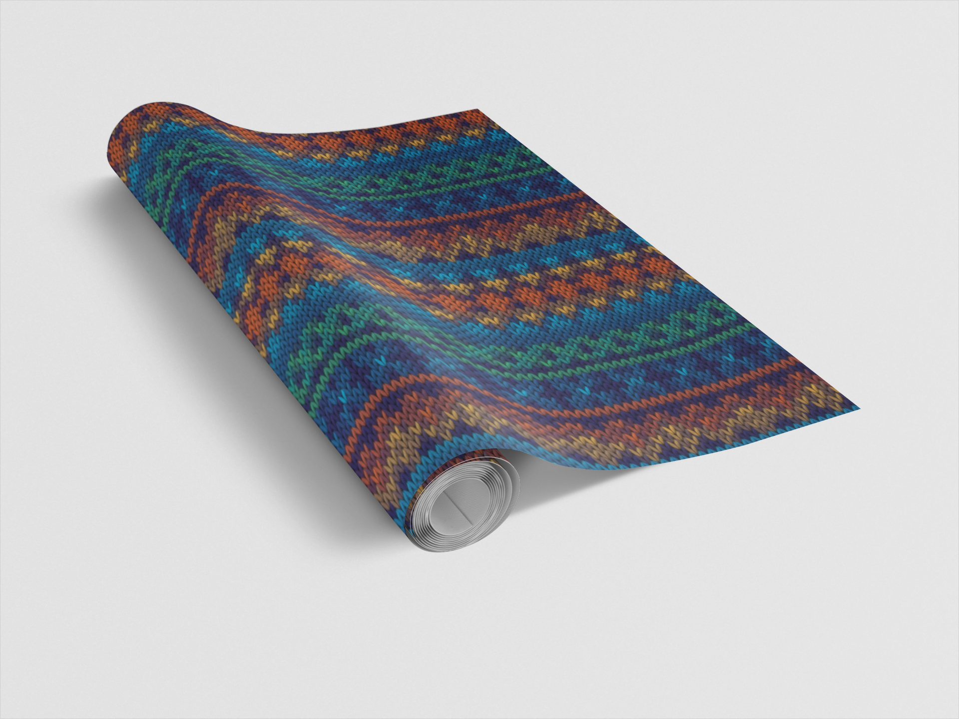 Roll of colorful patterned wallpaper on a light gray background