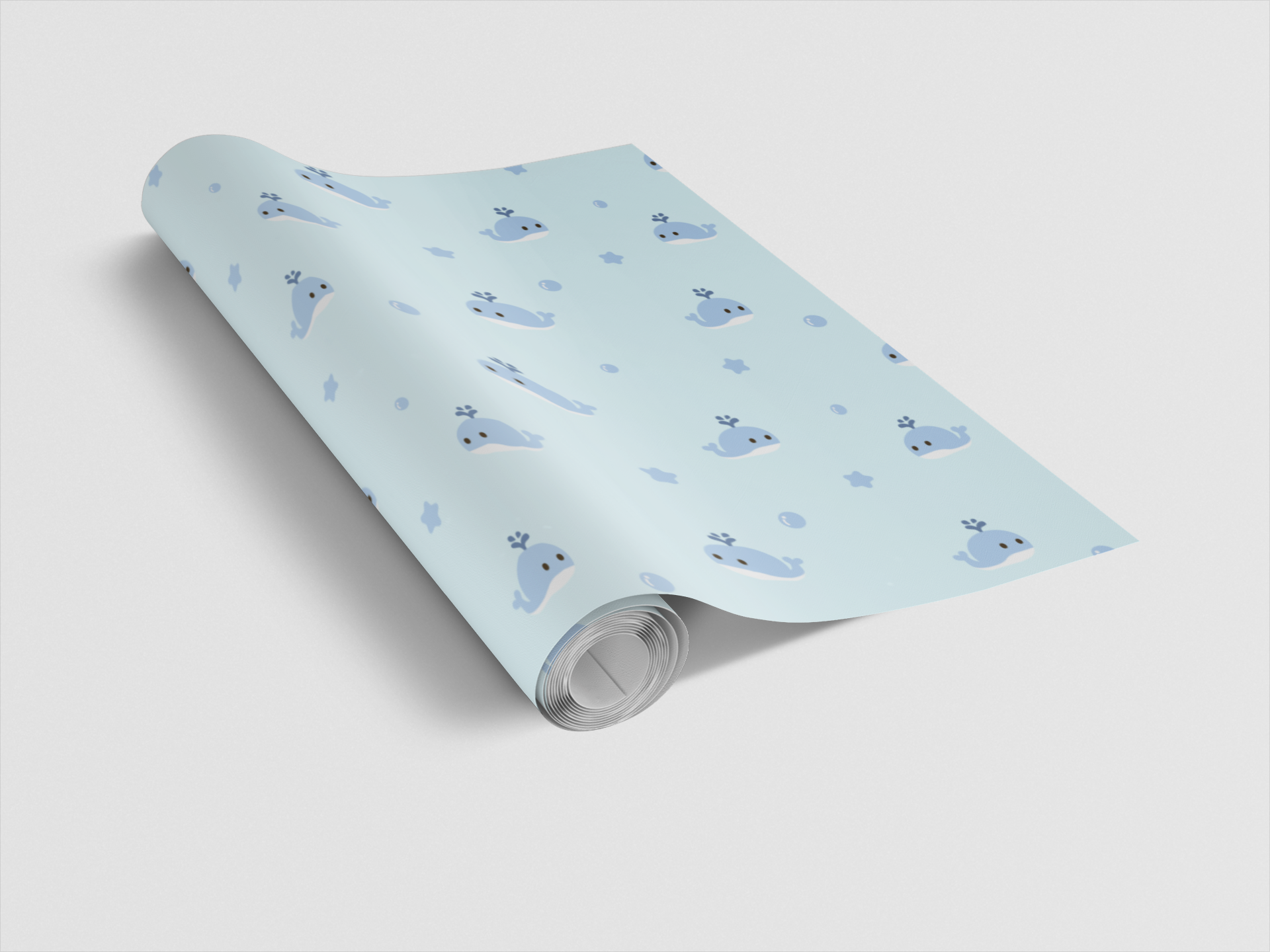 Roll of light blue wrapping paper with animal pattern on a light gray background